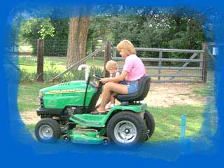 Ryann and Stacy on a tractor
